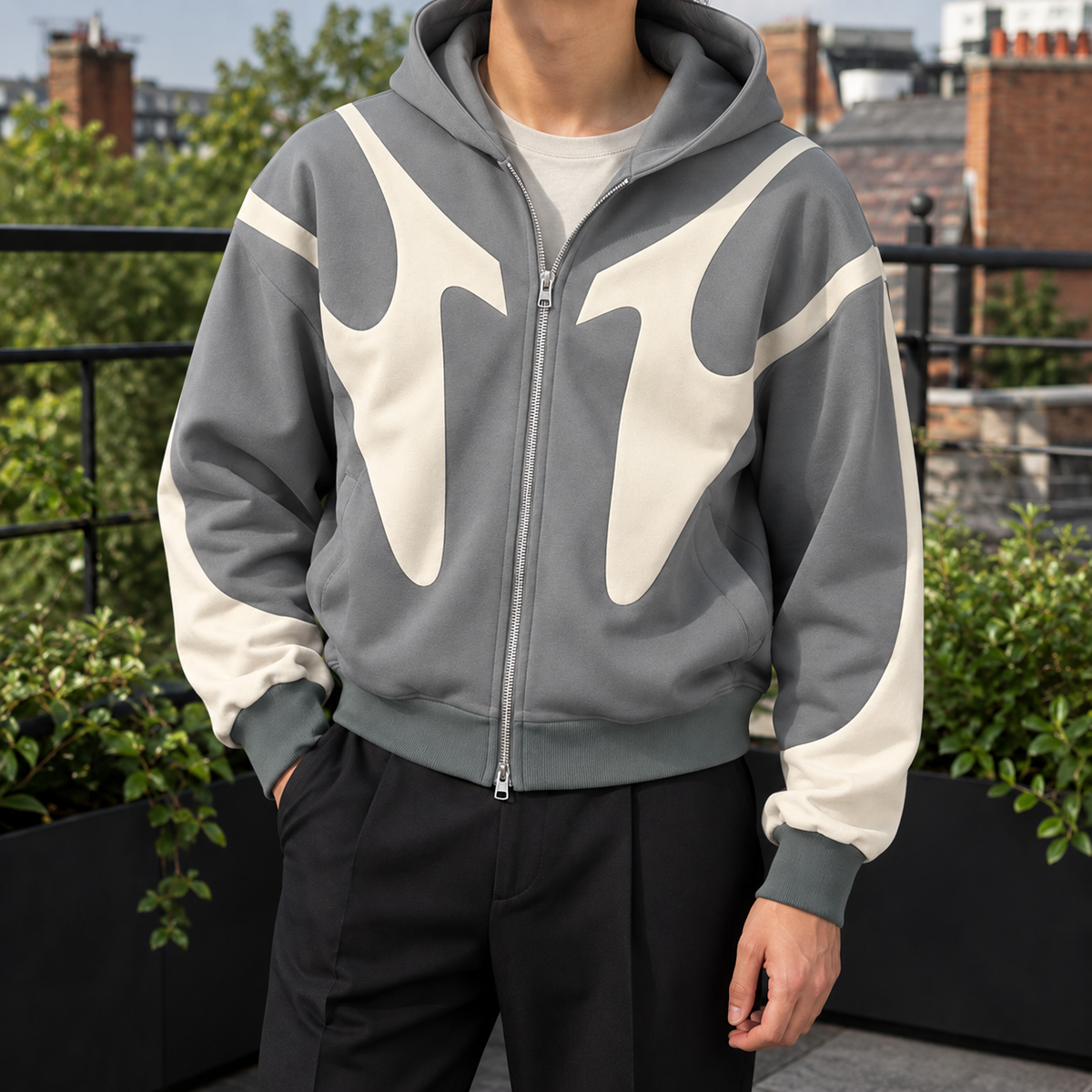 Men's contrast zip hoodie displayed in a casual outfit styling