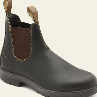 Men's Chelsea boots shown at an angle, highlighting the ankle-height design