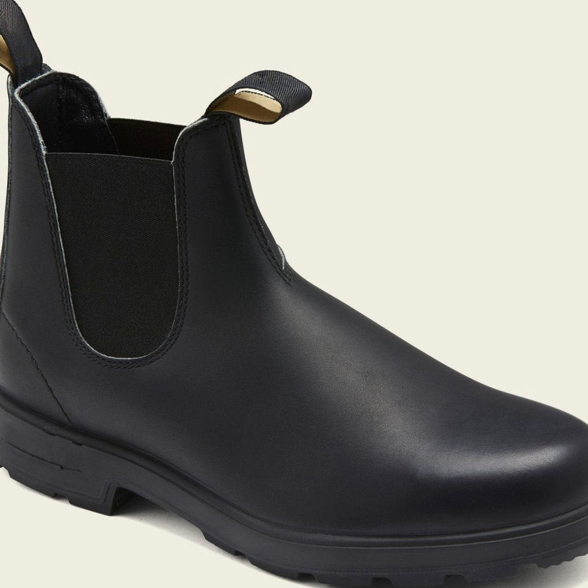 Back view of men's leather Chelsea boots with pull tabs and elastic side panels