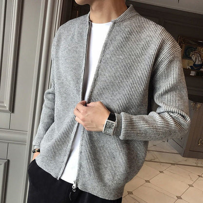 Men's classic cardigan styled as a warm layered outfit for fall and winter