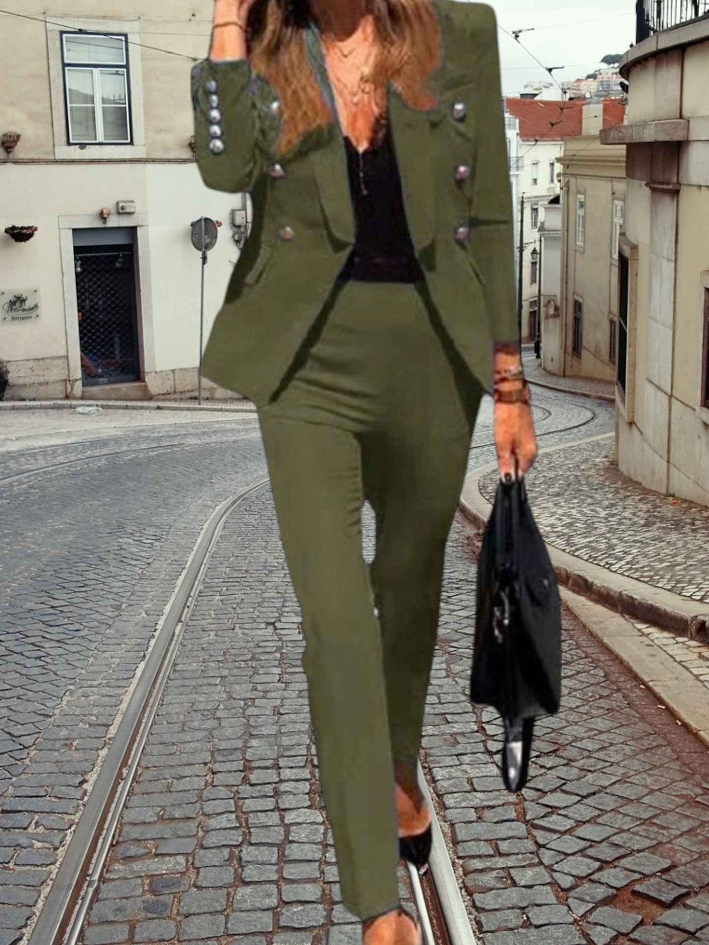 Eleganter Blazer und Hosen mit Knopfdesign eingestellt