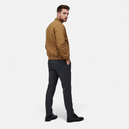 Men's bomber jacket showing ribbed collar, cuffs, and hem