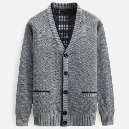Side view showing the fit and long sleeves of the men's cardigan