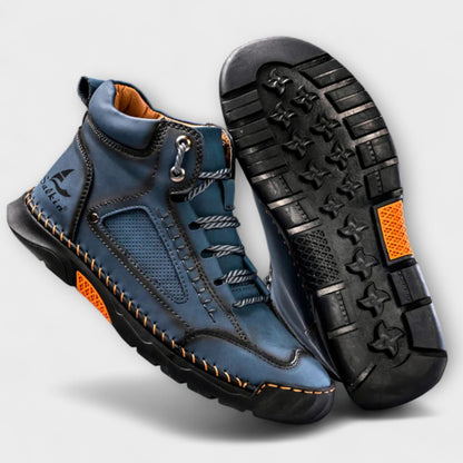 Men's leather boots shown from the side with a timeless silhouette