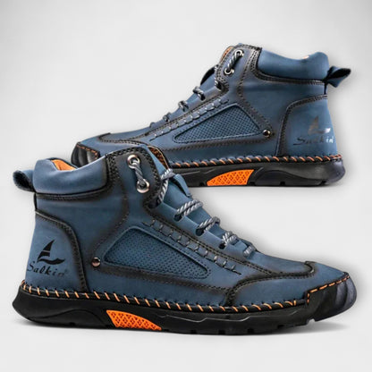 Detailed view of the stitching and leather construction on men's boots