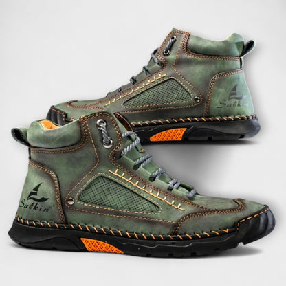 Angled view of classic leather boots designed for men's footwear