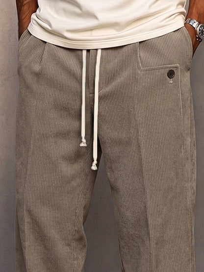 Men's drawstring corduroy pants shown in a relaxed casual style
