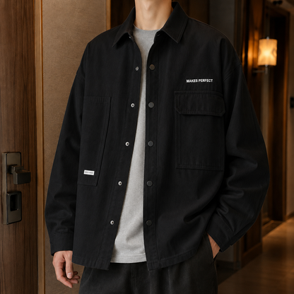 Close-up of the men's utility jacket showing its front pockets and details