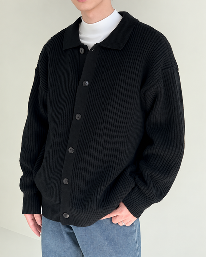Men's ribbed cardigan shown with its pointed collar detail