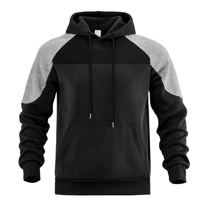 Front view of men's hoodie featuring textured contrast panels