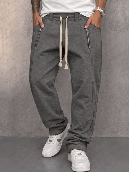 Close-up of the zipper pocket on men's casual sweatpants