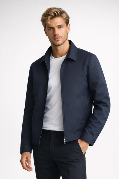Close-up of the padded longline coat's front, showing its elevated outerwear details.