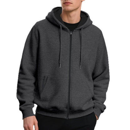 Men's hoodie showing ribbed cuffs and a relaxed fit