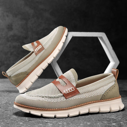 Close-up view of the textured mesh upper on a penny loafer