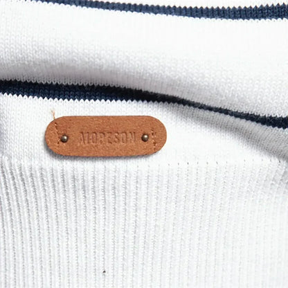Close-up of the striped knit texture on a men's sweater