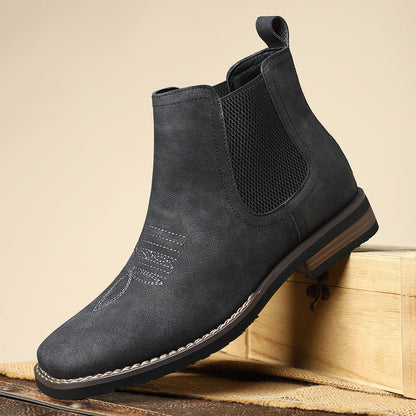 Close-up view of the leather upper on men's boots