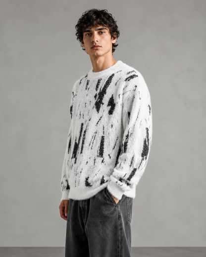 Men's abstract knit sweater displayed from the front