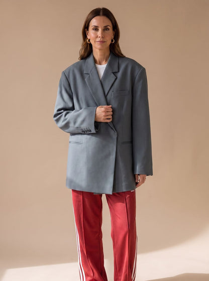 Damen Oversized Longblazer mit Reverskragen und Knopfdetails - Grau