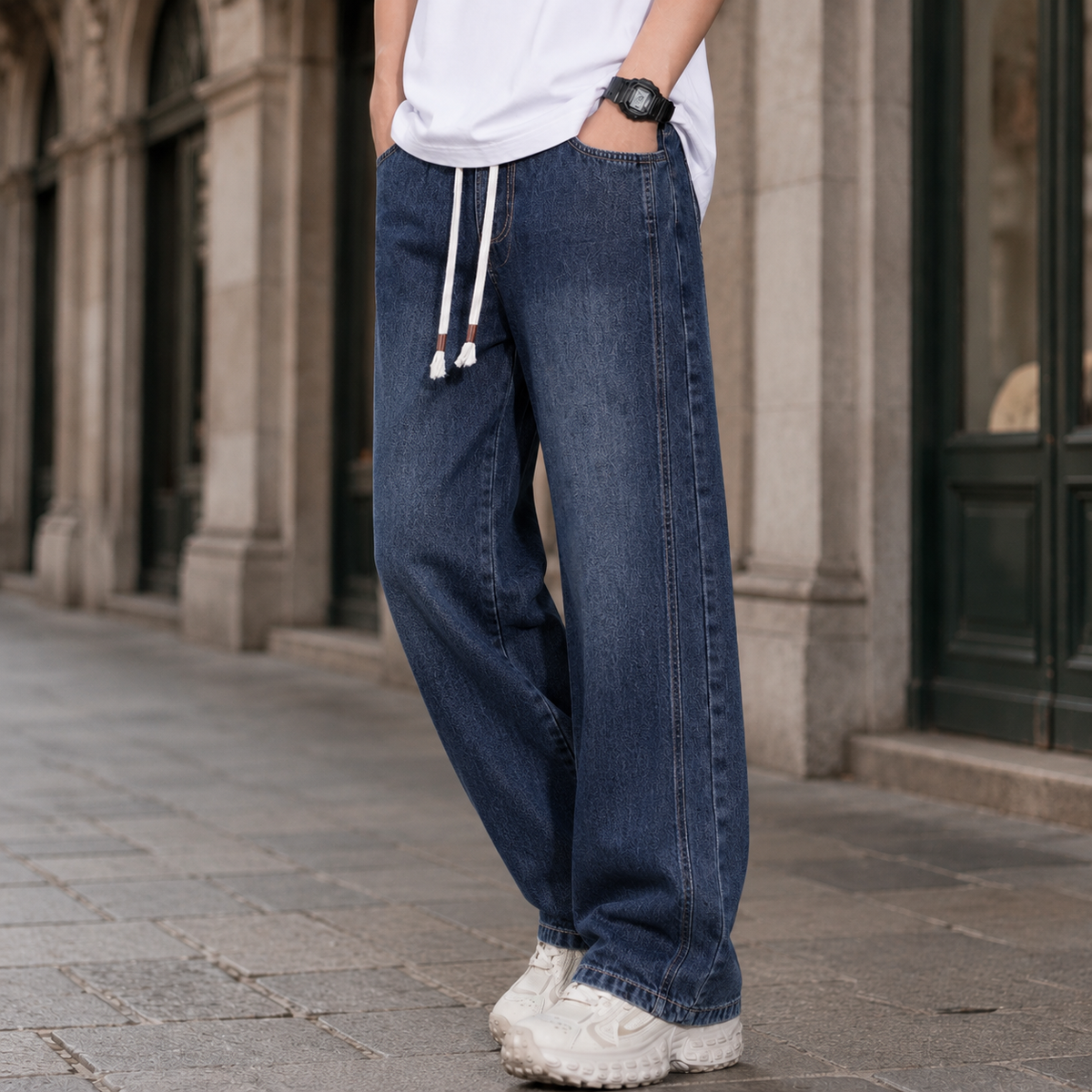Back view of men's relaxed jeans with wide legs and casual styling.