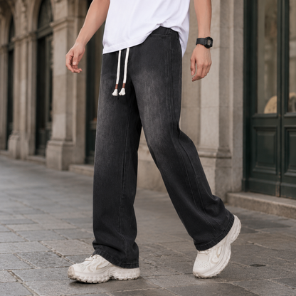 Full-length view of men's relaxed wide-leg jeans for everyday wear.
