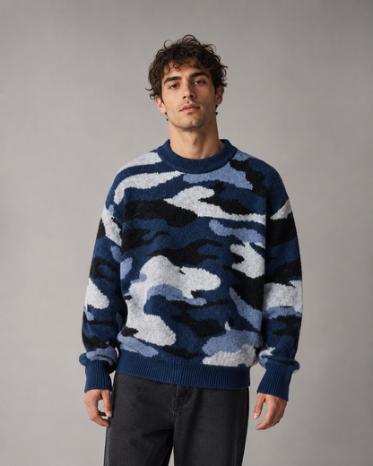 Men's camouflage knit sweater styled as an everyday casual outfit