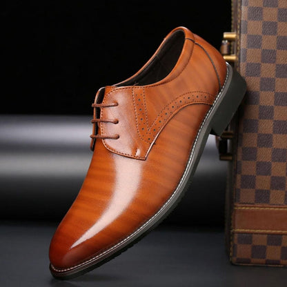 Close-up of polished leather and brogue detailing on men's dress shoes