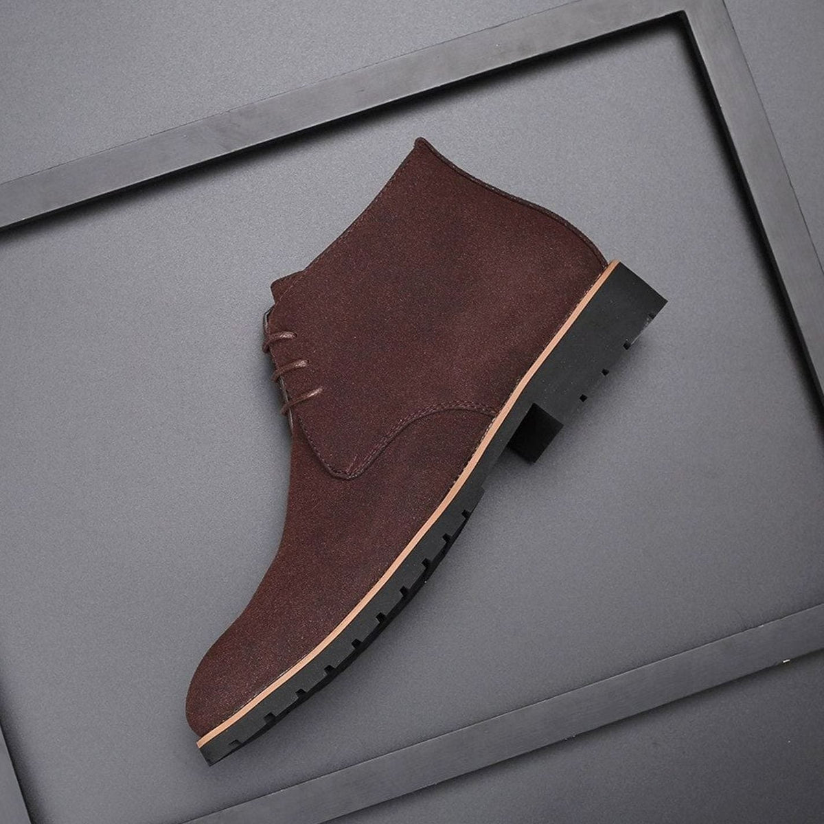 Close-up of the suede texture and lace-up detail on a chukka boot
