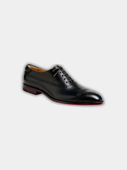Pair of men's minimal loafers shown from the side